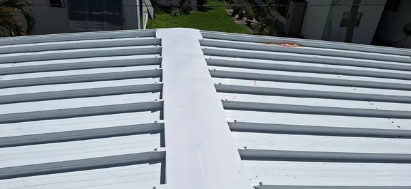 Aluminum roofover on mobile home in Spring Creek Village Bonita Springs