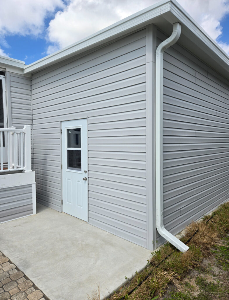 Custom Built shed attached to mobile Home in Osprey Bay